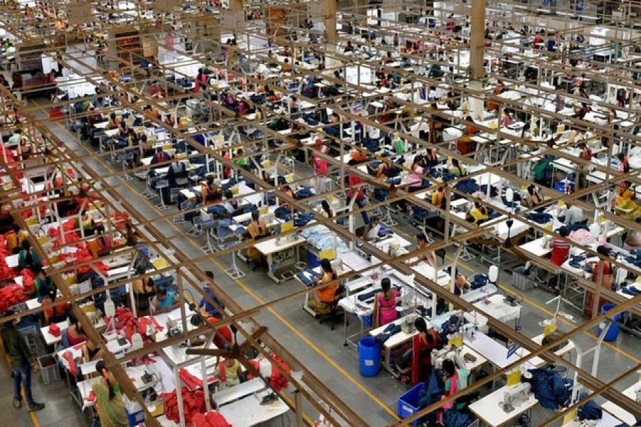 Garment workers stitch shirts at a textile factory of Texport Industries in Hindupur town in the southern state of Andhra Pradesh, India, February 9, 2022 – Reuters/Samuel Rajkumar