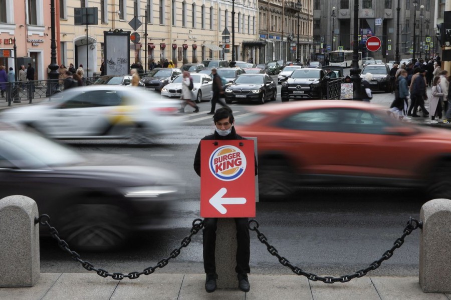 A Burger King promoter works at Nevsky Avenue in Saint Petersburg, Russia April 24, 2022. REUTERS/Anton Vaganov