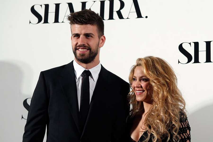 Colombian singer Shakira and FC Barcelona's soccer player Gerard Pique (L) posing during a photo call presenting her new album "Shakira" in Barcelona in 2014 –Reuters file photo