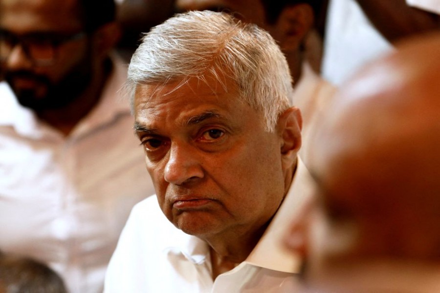 Ranil Wickremesinghe, newly appointed prime minister, arrives at a Buddhist temple after his swearing-in ceremony amid the country's economic crisis, in Colombo, Sri Lanka, May 12, 2022. REUTERS/Dinuka Liyanawatte