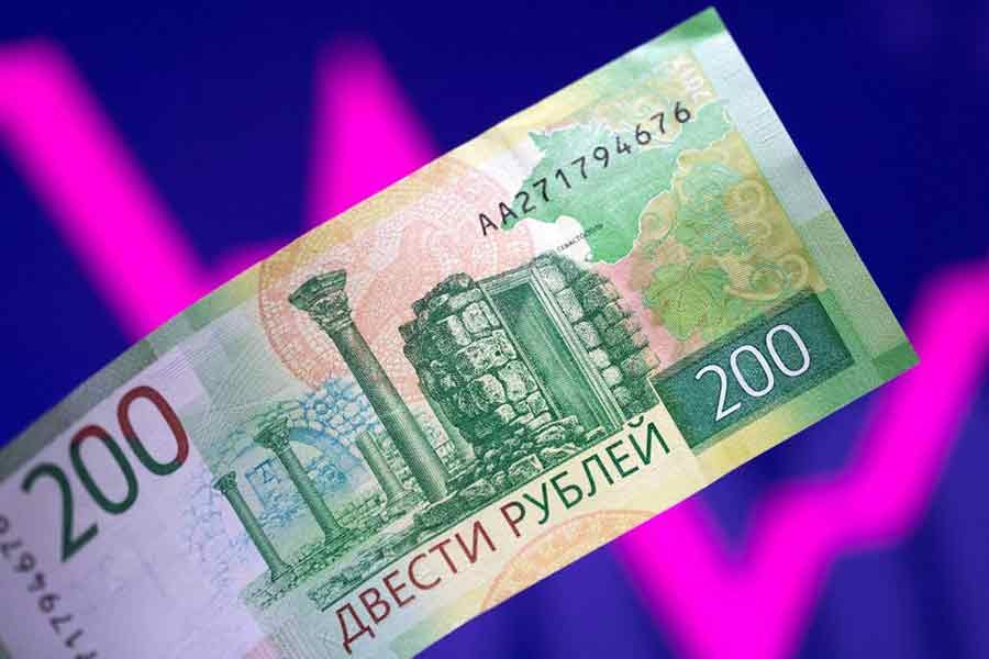 Rouble weakens as Russia slightly eases capital controls