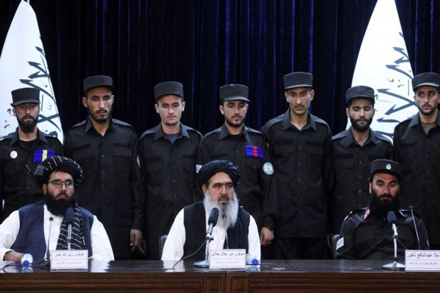 Afghan Taliban's Deputy Head of Interior Ministry Mawlawi Noor Jalal Jalali speaks at a news conference about the new Afghan police uniform, in Kabul, Afghanistan, Jun 8, 2022. REUTERS/Ali Khara