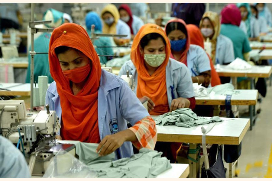 Workers at a RMG factory in Dhaka. 	—Xinhua Photo