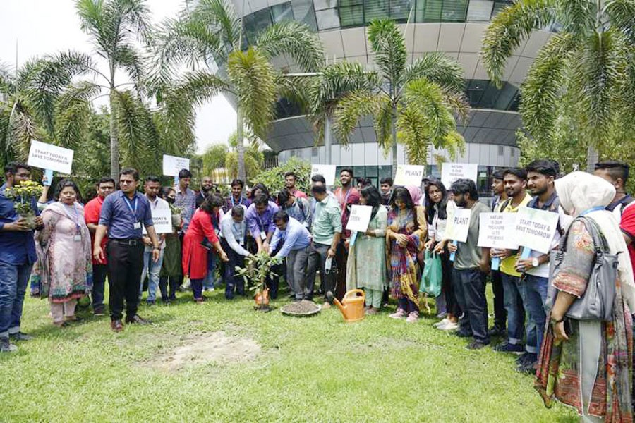 Teachers and students at a private university in Dhaka celebrates the World Environment Day on June 5, 2022 	—AIUB Photo