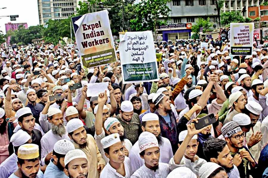 Several organisations, including Islami Andolan Bangladesh, brought out a procession from Baitul Mukarram National Mosque in the city after Juma prayers on Friday, protesting India's BJP leaders Nupur Sharma and Naveen Jindal's derogatory comment on Prophet Muhammad (PBUH) —Focus Bangla photo