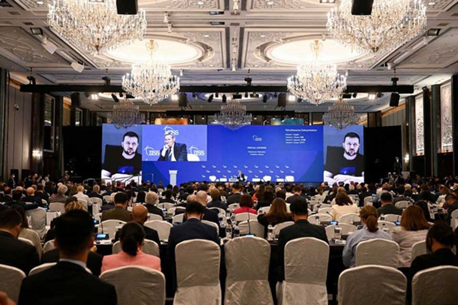 Ministers and delegates listen to a virtual special address by Ukraine's President Volodymyr Zelenskiy at the 19th Shangri-La Dialogue in Singapore Jun 11, 2022. REUTERS/Caroline Chia