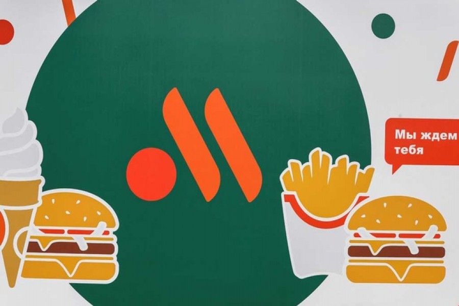 A view shows a banner with the logo of a new restaurant chain, following McDonald's Corp company's decision to sell its restaurants in Russia to one of its local licensees that will rebrand them under a new name, in Moscow, Russia June 12, 2022. REUTERS