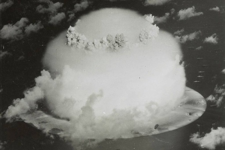 A mushroom cloud rises with ships below during Operation Crossroads nuclear weapons test on Bikini Atoll, Marshall Islands in this 1946 handout provided by the US Library of Congress. US Library of Congress via Reuters