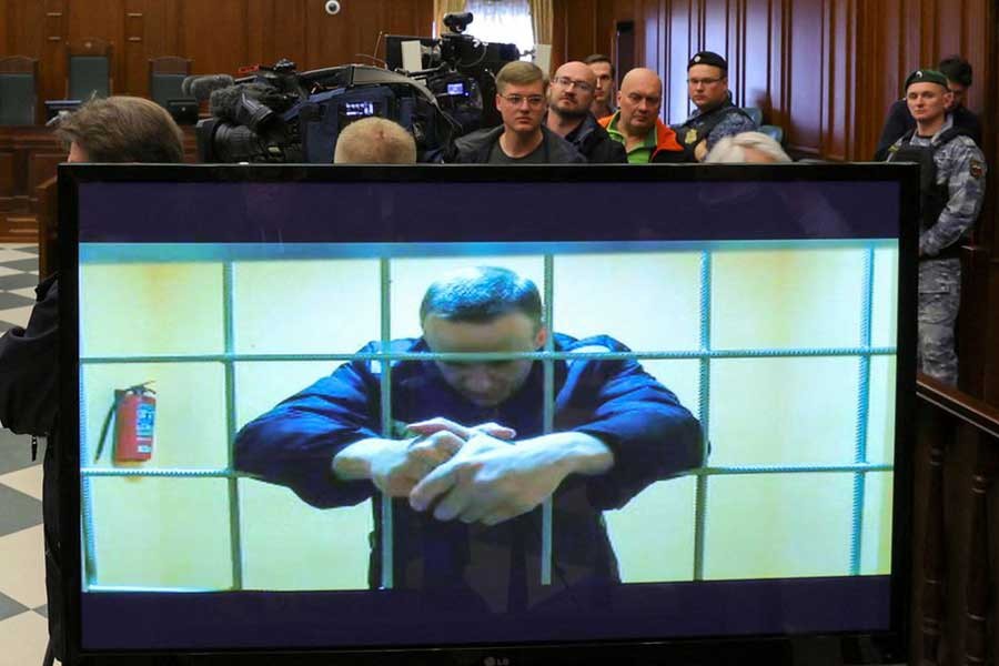 Russian opposition leader Alexei Navalny is seen on a screen via a video link from the IK-2 corrective penal colony in Pokrov during a court hearing in Moscow on May 24 this year –Reuters file photo