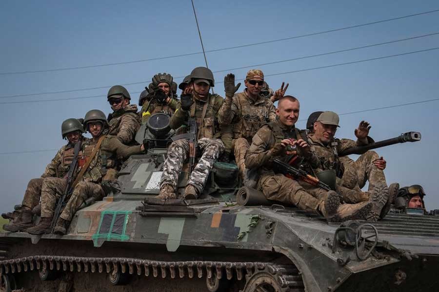 Ukrainian servicemen riding an infantry fighting vehicle, amid Russia-Ukraine war, in Donetsk region of Ukraine on Tuesday –Reuters photo