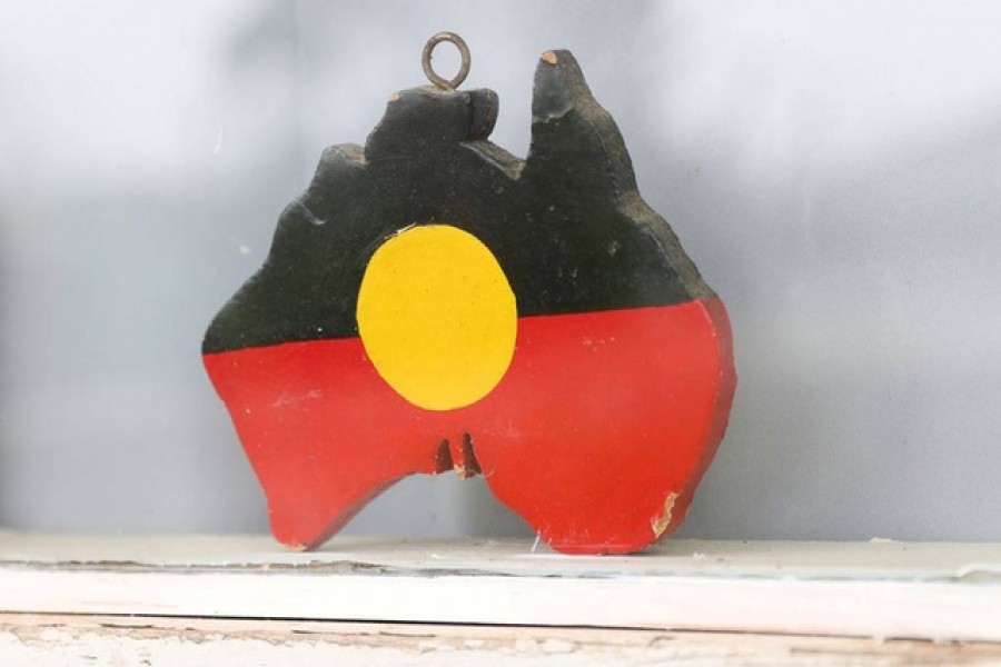 A depiction of the Australian Aboriginal Flag is seen on a window sill at the home of indigenous Muruwari elder Rita Wright, a member of the "Stolen Generations", in Sydney, Australia, January 19, 2021. REUTERS