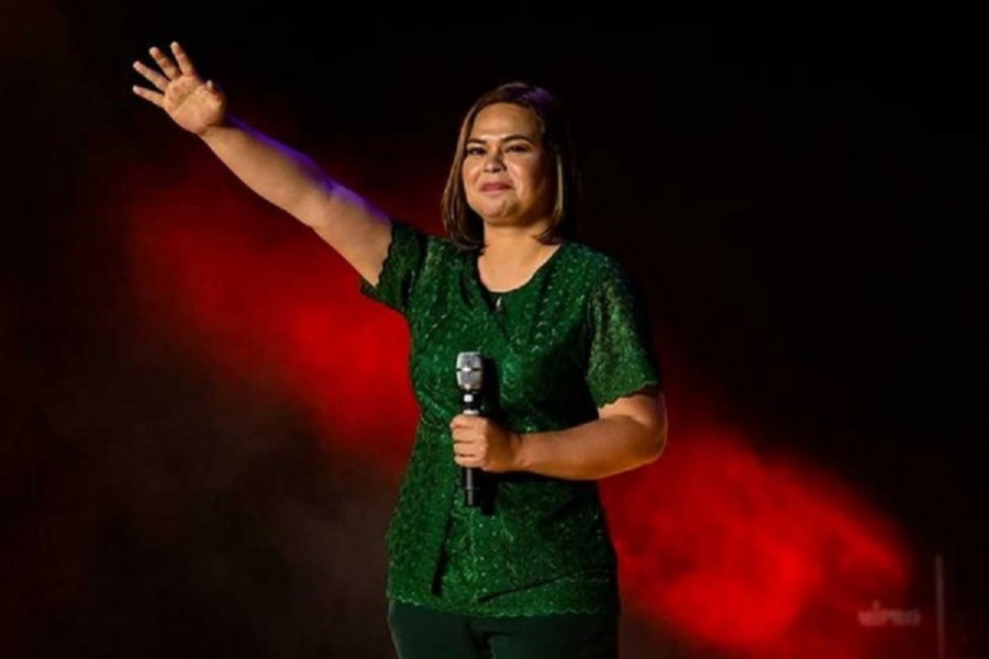 Vice-presidential candidate Sara Duterte-Carpio, daughter of Philippine President Rodrigo Duterte, waves to her supporters during the first day of campaign period for the 2022 presidential election, at the Philippine Arena, in Bocaue, Bulacan province, Philippines, February 8, 2022. REUTERS/Lisa Marie David