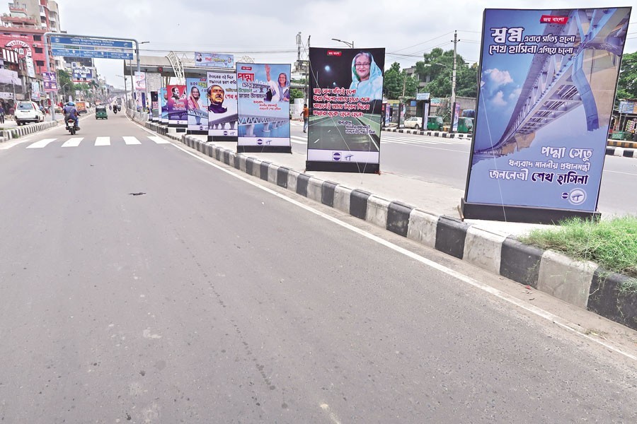 With the Padma Bridge opening tomorrow, a variety of banners and posters have been put on the street in Dhaka congratulating the Prime Minister. The photo was taken from Dholaipar area in the capital on Thursday — FE photo