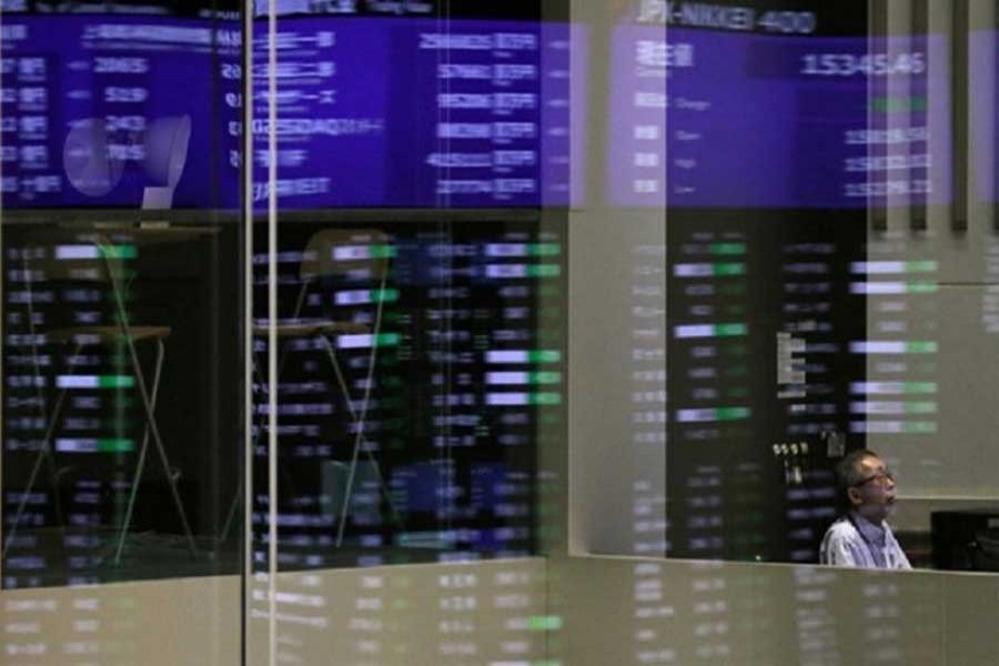 World shares gain as investors shrug off downbeat data