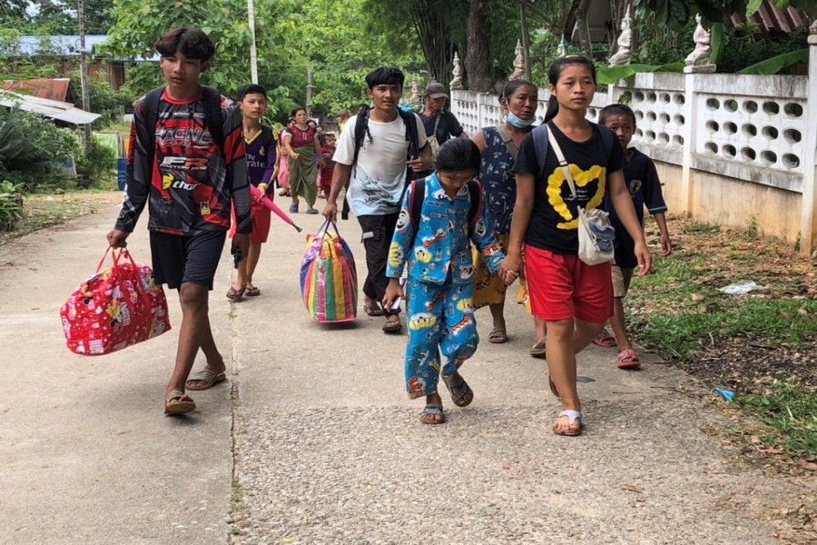 ocals flee their homes after a Myanmar fighter jet entered Thailand's airspace, in Phop Phra district in Tak province, Thailand June 30, 2022. REUTERS/Stringer