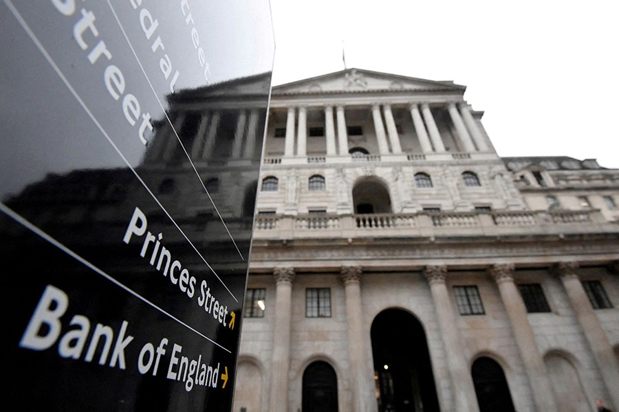 The Bank of England (BoE) building is reflected in a sign, London, Britain on December 16, 2021 — Reuters/Files