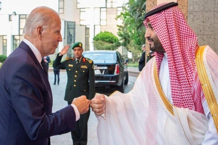 Saudi Crown Prince Mohammed bin Salman fist bumps US President Joe Biden upon his arrival at Al Salman Palace, in Jeddah, Saudi Arabia, July 15, 2022. Bandar Algaloud/Courtesy of Saudi Royal Court/Handout via REUTERS