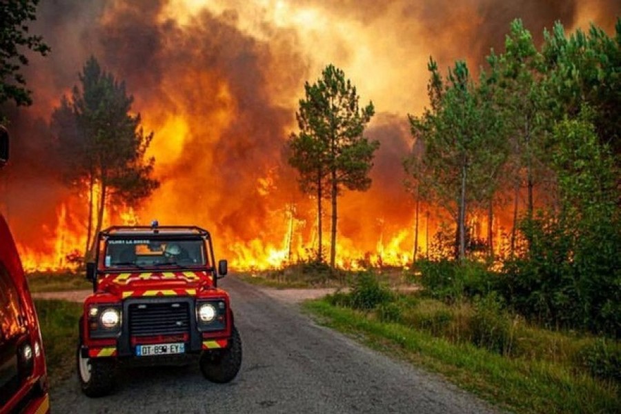 Wildfires rage in France, Spain as heatwaves sear Europe