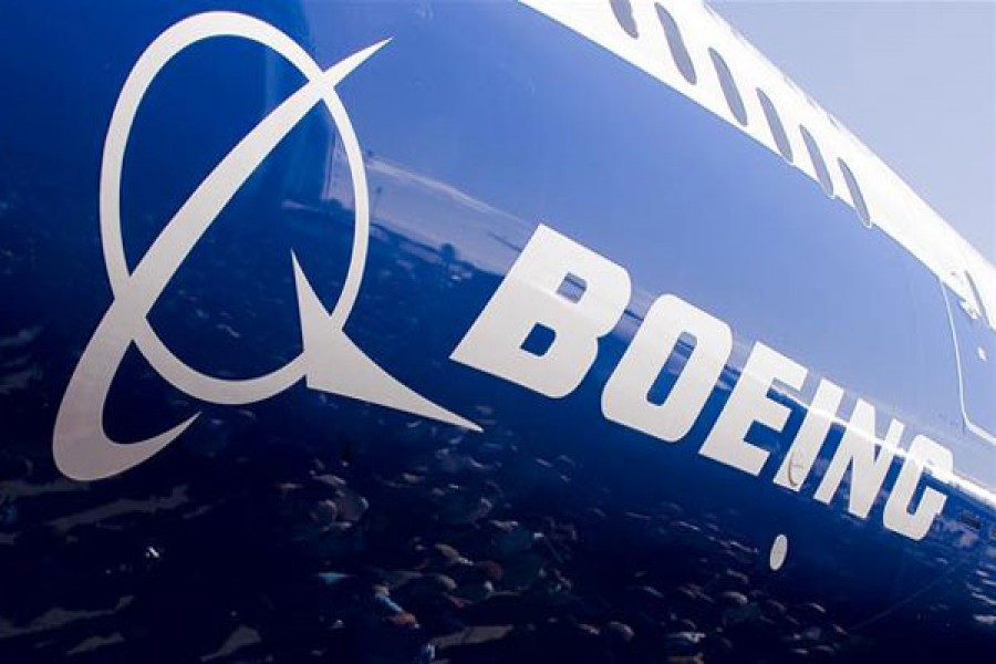 Boeing trims its projected industry-wide demand for airplanes over next 20 years