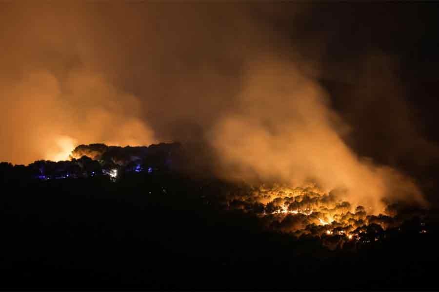 A wildfire burning during night-time in southern Spain on Saturday –Reuters photo