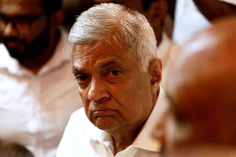 Ranil Wickremesinghe, newly appointed prime minister, arrives at a Buddhist temple after his swearing-in ceremony, amid the country's economic crisis, in Colombo, Sri Lanka on May 12, 2022 — Reuters/Files