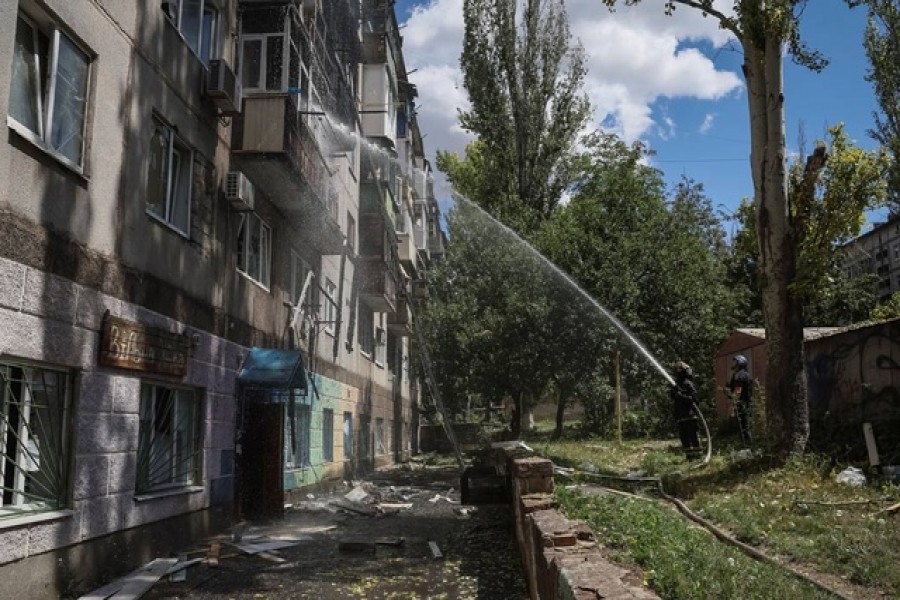 Firefighters work to put out a fire in a residential building after a Russian military strike, as Russia's attack on Ukraine continues, in Kramatorsk, in Donetsk region, Ukraine July 19, 2022. REUTERS