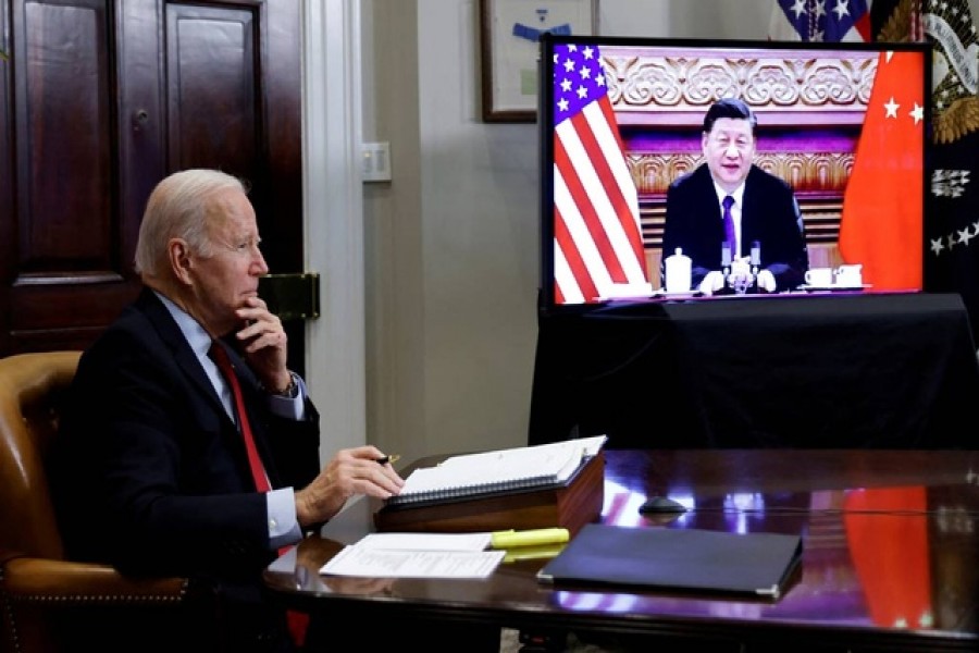US President Joe Biden speaks virtually with Chinese leader Xi Jinping from the White House in Washington, Nov 15, 2021. REUTERS