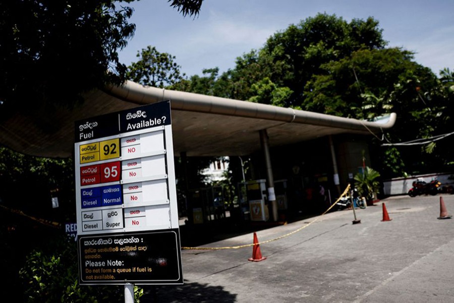 A closed Ceylon Petroleum Corporation fuel station displays the availability of all fuel types on a board due to fuel shortage, amid the country's economic crisis, in Colombo, Sri Lanka on June 27, 2022 — Reuters/Files