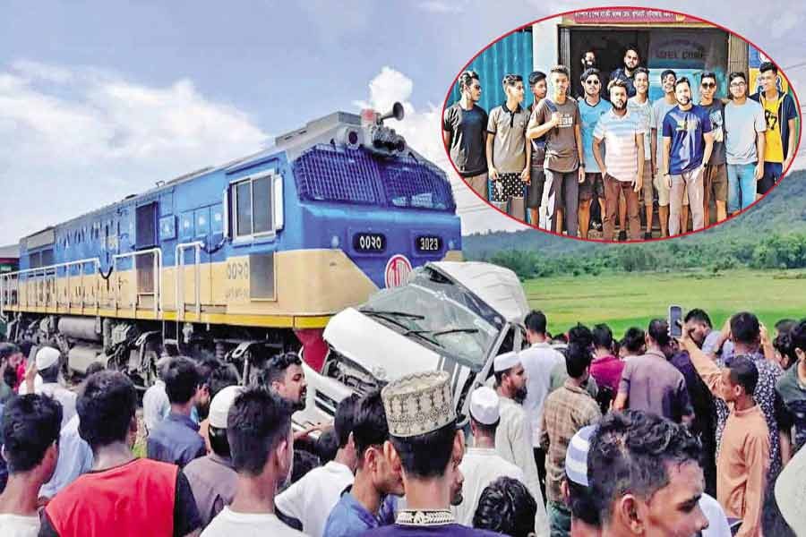 Eleven young men perished on the rail tracks when their microbus was hit by a speeding train at a level crossing in Chattogram's Mirersarai area at around 2 pm on Friday. The victims (inset) were travelling in the microbus. This photo of the victims was taken before they embarked on their trip. Photo: Focus Bangla