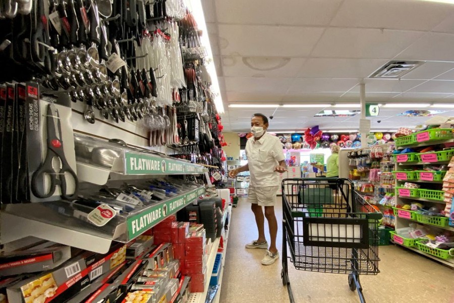 A shopper wearing a face mask is pictured at a Dollar Tree store in Pasadena - Reuters photo