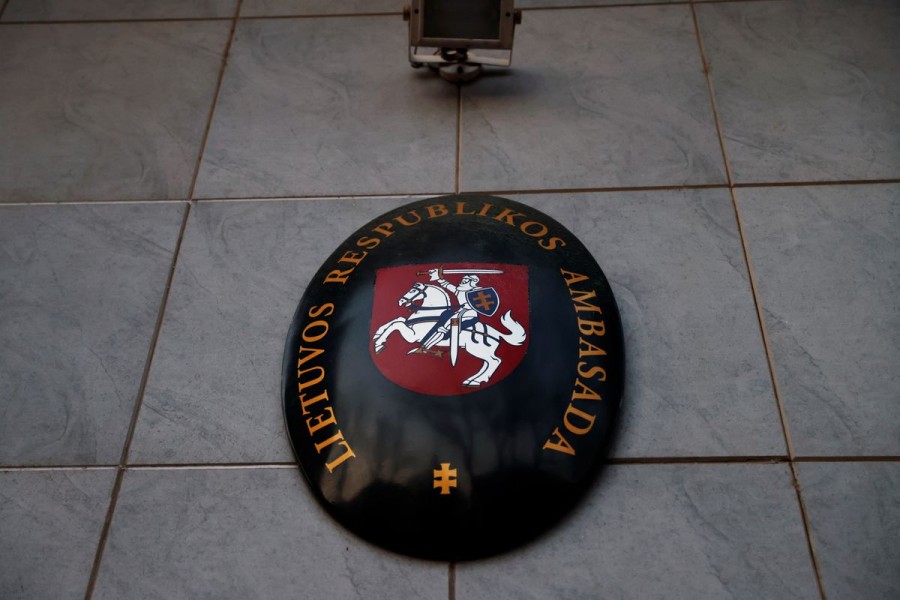 The Lithuanian state emblem is seen at its embassy in Beijing, China December 15, 2021. REUTERS/Carlos Garcia Rawlins