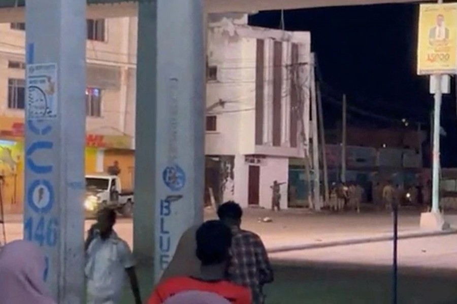Members of the security forces take position after, according to police and intelligence officers, unidentified armed attackers took control of a hotel, in Mogadishu, Somalia on August 19, 2022 in this screen grab from a video obtained from social media — Abdalle Ahmed Mumin/via REUTERS