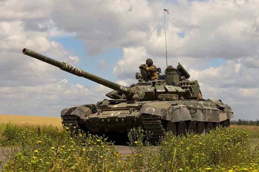 Russian troops driving a tank in a Russian-held area in Zaporizhzhia region of Ukraine on July 23 this year –Reuters file photo