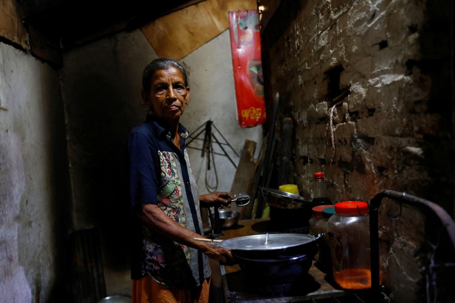 Manel Peiris, 68, poses in her kitchen, amid the country's economic crisis, in Colombo, Sri Lanka on August 2, 2022 — Reuters/Files