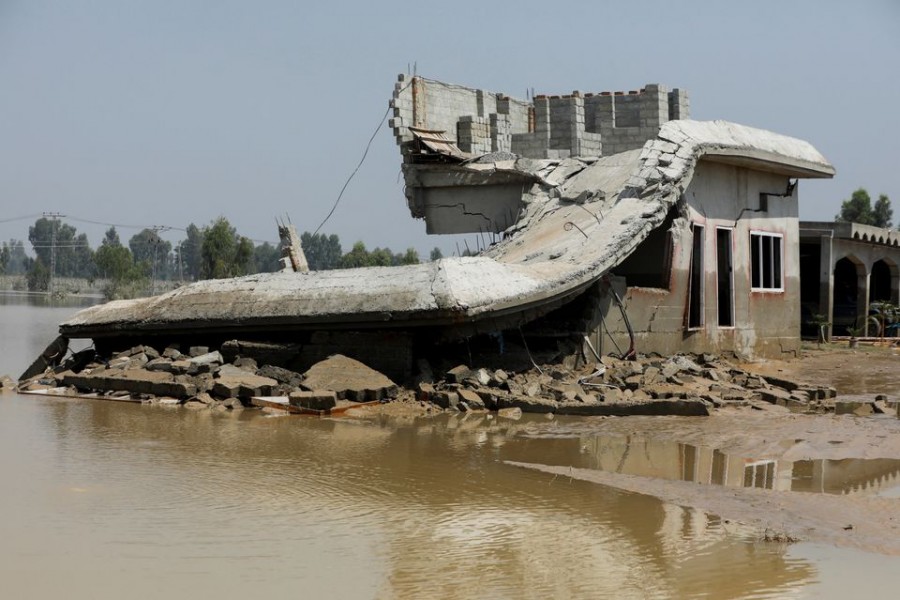 A general view of a collapsed building, following rains and floods during the monsoon season in Nowshera, Pakistan August 30, 2022. REUTERS/Fayaz Aziz