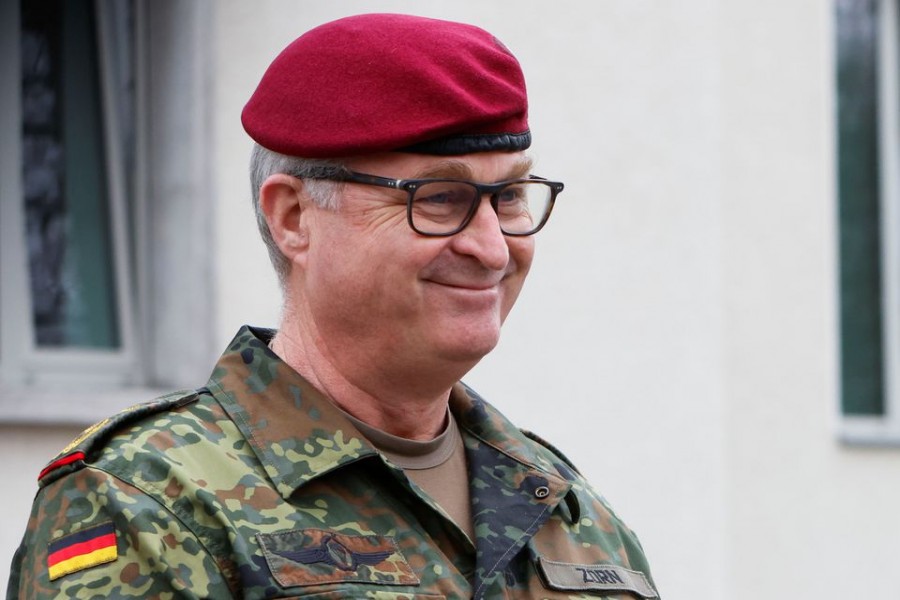 Inspector General of the German Armed Forces (Bundeswehr) Eberhard Zorn waits for the arrival of German Chancellor Olaf Scholz at the German Army Operations Command in Schwielowsee, Germany March 4, 2022. REUTERS/Michele Tantussi/File Photo