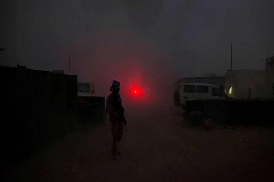 A United Nations peacekeeper secures the MINUSMA base after a mortar attack in Kidal Mali, Jun 8, 2017. MINUSMA/Sylvain Liechti handout via REUTERS