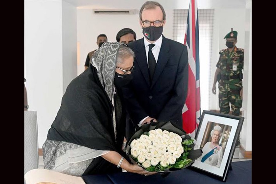 PM pays homage to Queen Elizabeth II, signs condolence book