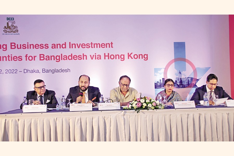 Dhaka Chamber of Commerce and Industry (DCCI) President Rizwan Rahman speaks at the seminar styled 'Exploring business and investment opportunities for Bangladesh via Hong Kong' jointly organised by DCCI and Hong Kong Trade Development Council at a city hotel on Monday. Commerce Minister Tipu Munshi (centre) attended the event as the chief guest