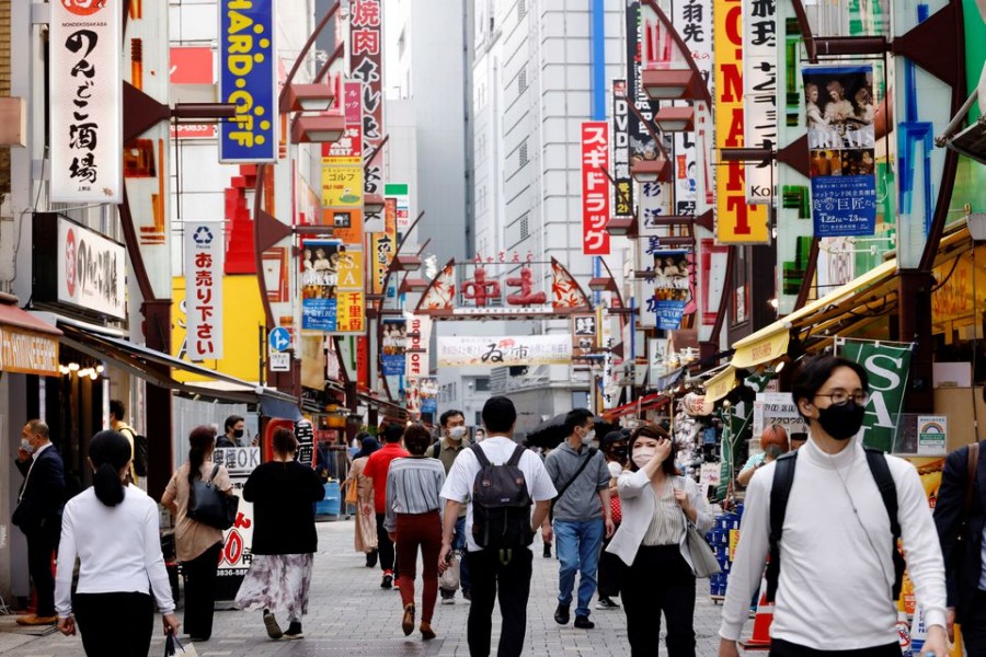 People make their way at Ameyoko shopping district in Tokyo, Japan, May 20, 2022. REUTERS/Kim Kyung-Hoon/File Photo