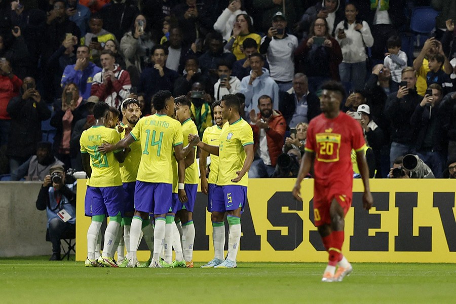 Brazil's Richarlison celebrates with teammates after scoring their third goal in friendly match against Ghana at Stade Oceane, Le Havre, France on September 23, 2022 — Reuters photo