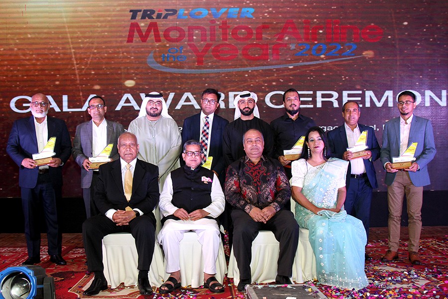 Representatives of Gold Award winner airlines pose for a group photo with Md. Mahbub Ali MP, State Minister for Civil Aviation and Tourism; Kazi Wahidul Alam, Editor, The Bangladesh Monitor; Professor Shibli Rubayat-Ul-Islam, Chairman, BSEC; and Nisha Tasnim, COO, Triplover; at the award ceremony of Triplover-Monitor Airline of the Year-2022 held at a city hotel on Friday