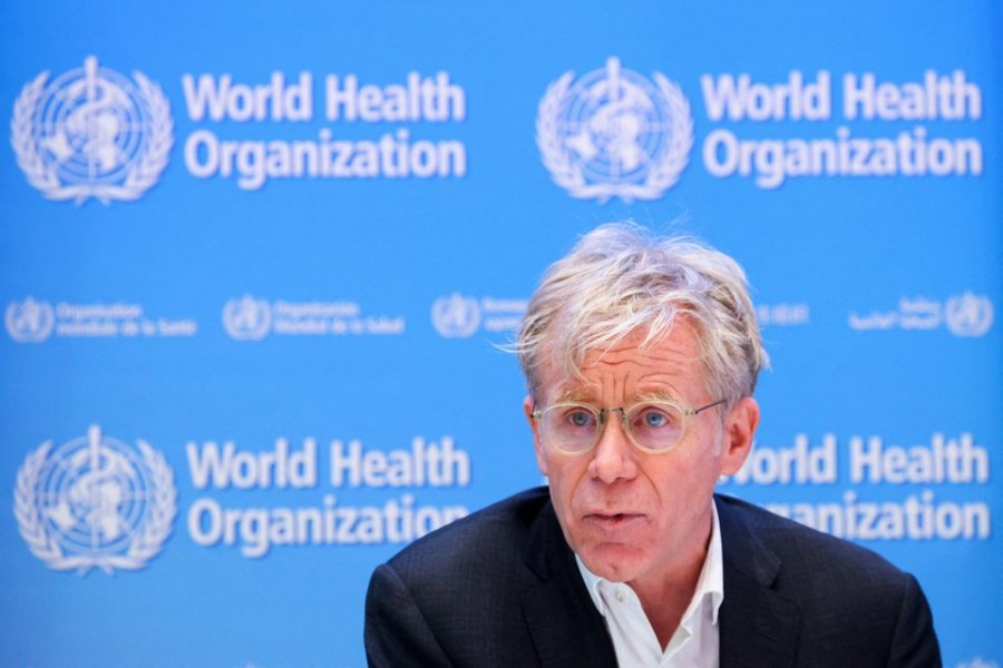 Bruce Aylward, Senior Advisor to the Director-General of the World Health Organization (WHO), speaks during a news conference in Geneva, Switzerland, December 20, 2021. REUTERS/Denis Balibouse