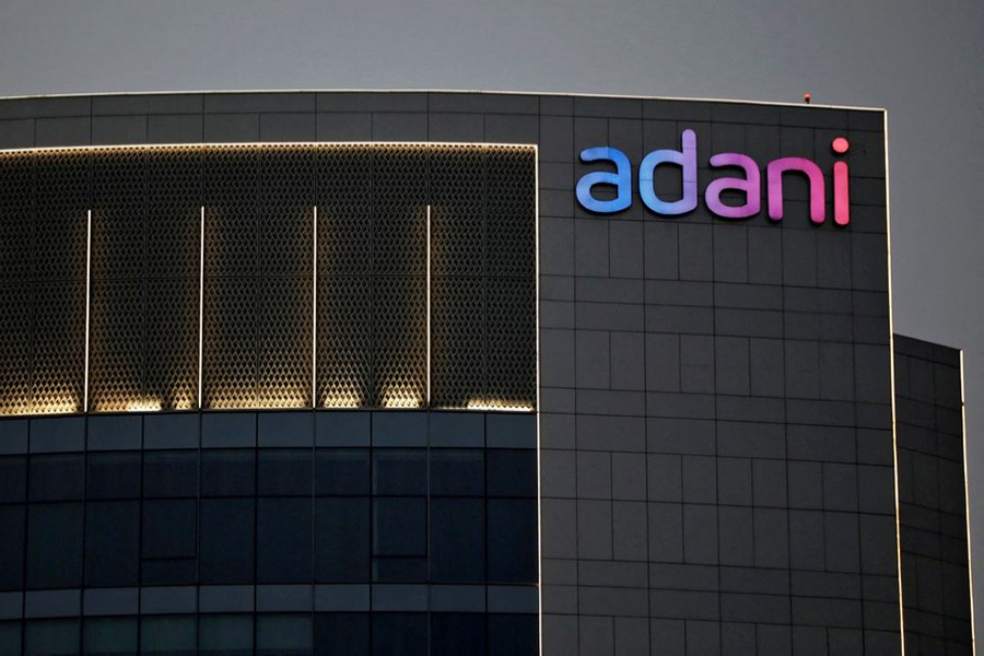 The logo of the Adani Group is seen on the facade of one of its buildings on the outskirts of Ahmedabad, India on April 13, 2021 — Reuters/Files