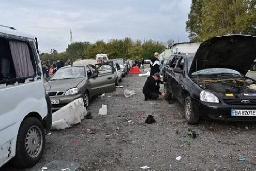 Cars destroyed by a Russian missile strike, that hit a convoy of civilian vehicles amid Russia's attack on Ukraine, are seen in Zaporizhzhia, Ukraine September 30, 2022. REUTERS