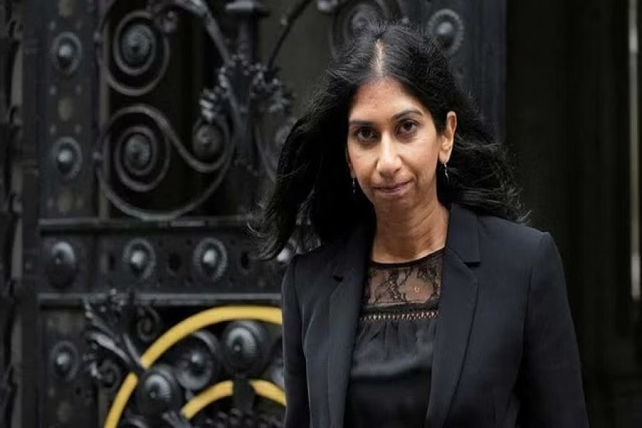 Home secretary Suella Braverman QC walks outside 10 Downing Street, following the passing of Britain's Queen Elizabeth, in London, Britain, September 9, 2022. REUTERS