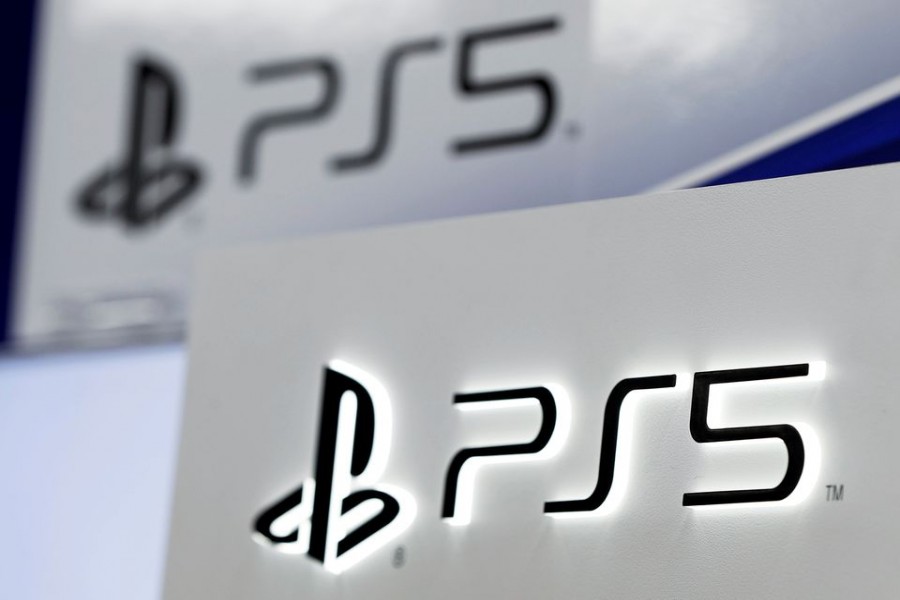 The logos of Sony's PlayStation 5 are displayed at the consumer electronics retailer chain Bic Camera, ahead of its official launch, in Tokyo, Japan November 10, 2020. REUTERS/Issei Kato