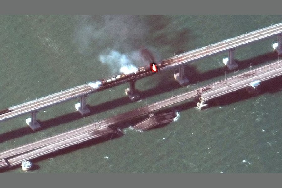 A satellite image shows a close up view of smoke rising from a fire on the Kerch bridge in the Kerch Strait, Crimea, Oct 8, 2022. Maxar Technologies/Handout via REUTERS