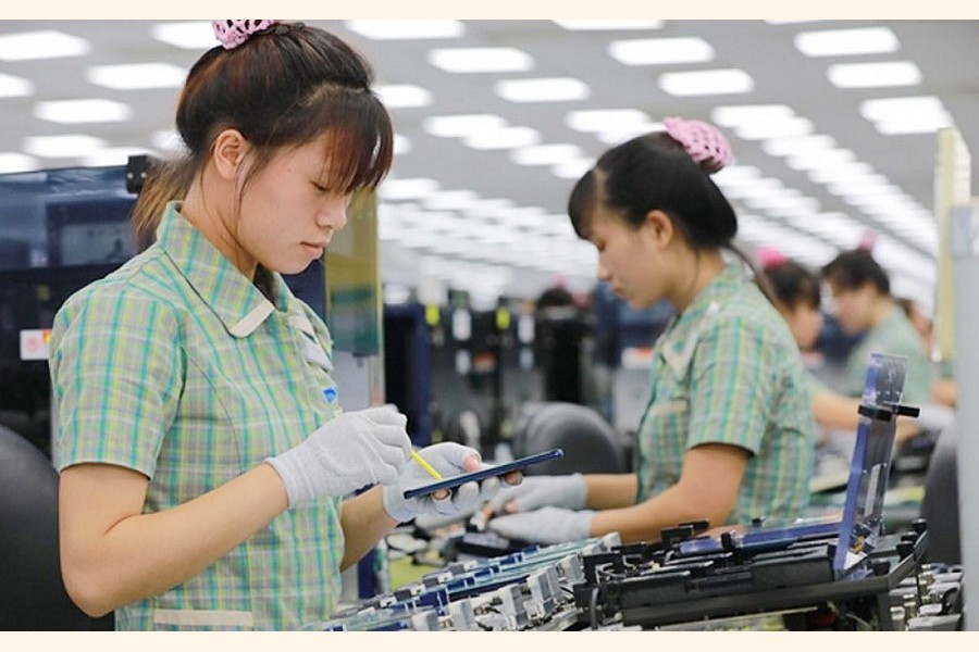Female workers at a factory in Vietnam. 	—Vietnam Times Photo