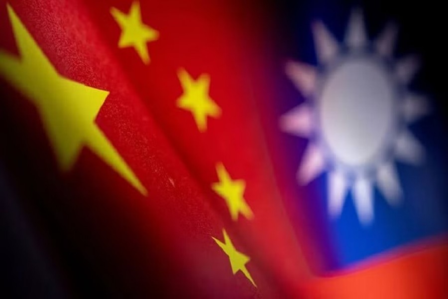 Chinese and Taiwanese printed flags are seen in this illustration taken, Apr28, 2022.REUTERS